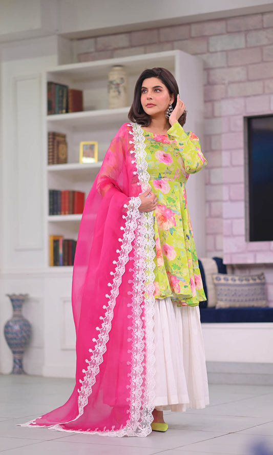 Floral tones paired with a white cotton gharara